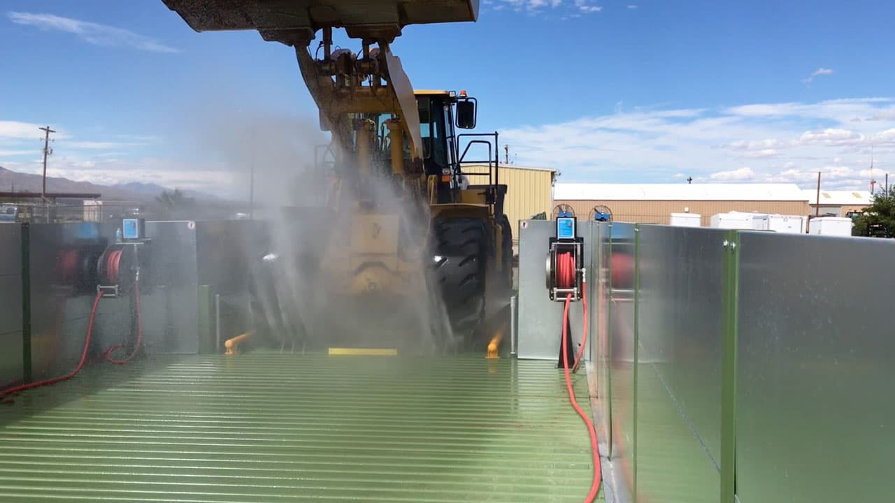 Above-ground steel wash rack cleaning heavy equipment